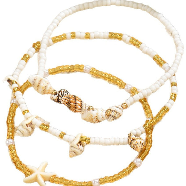 Enkelbandjes set wit goud met schelpen - Medase