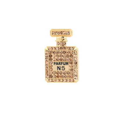 Gouden parfum N5 flesje broche met champagne strass steentjes 4,5cm