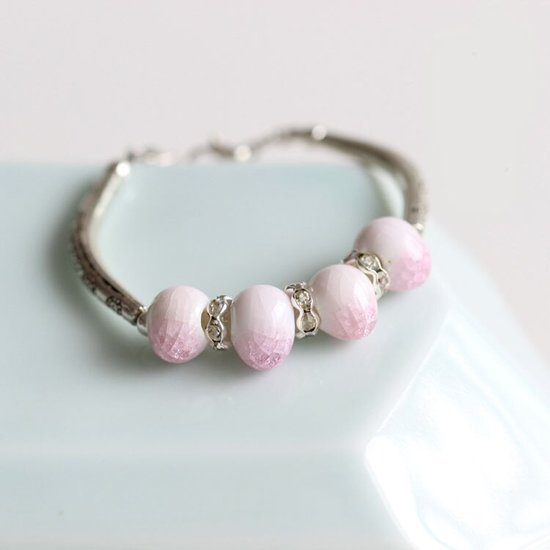 Armband keramiek kraal roze/wit - Medase