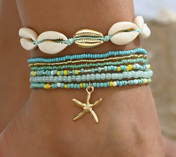 Turquoise enkelbandjes set met schelpen en gouden zeester bedel