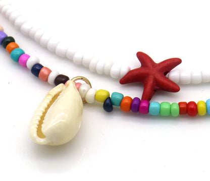 Set van 2 kettingen wit en multicolor met rode zeester en schelp detail - Medase