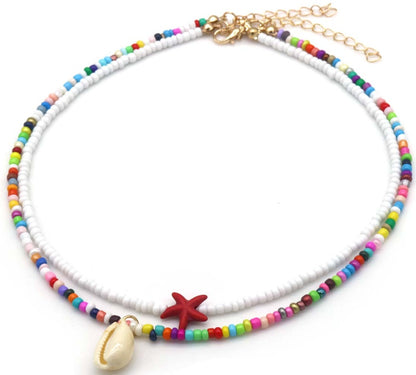 Set van 2 kettingen wit en multicolor met rode zeester en schelp - Medase
